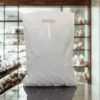 Durable punch handle plastic bags for retail packaging